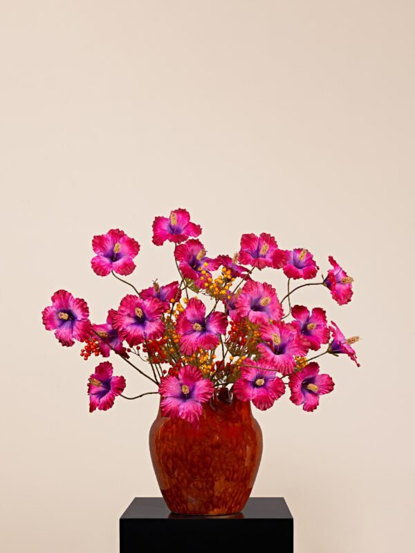 Zen Fuchsia Flame hibiscus berry arrangement with fuchsia hibiscus and faux berries in a heart-shaped ceramic vase