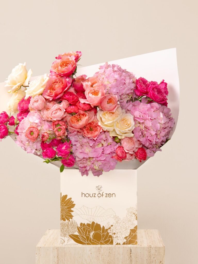 Pink flower bouquet with hydrangea, peach roses, and Ohara roses in a Houz of Zen flower box