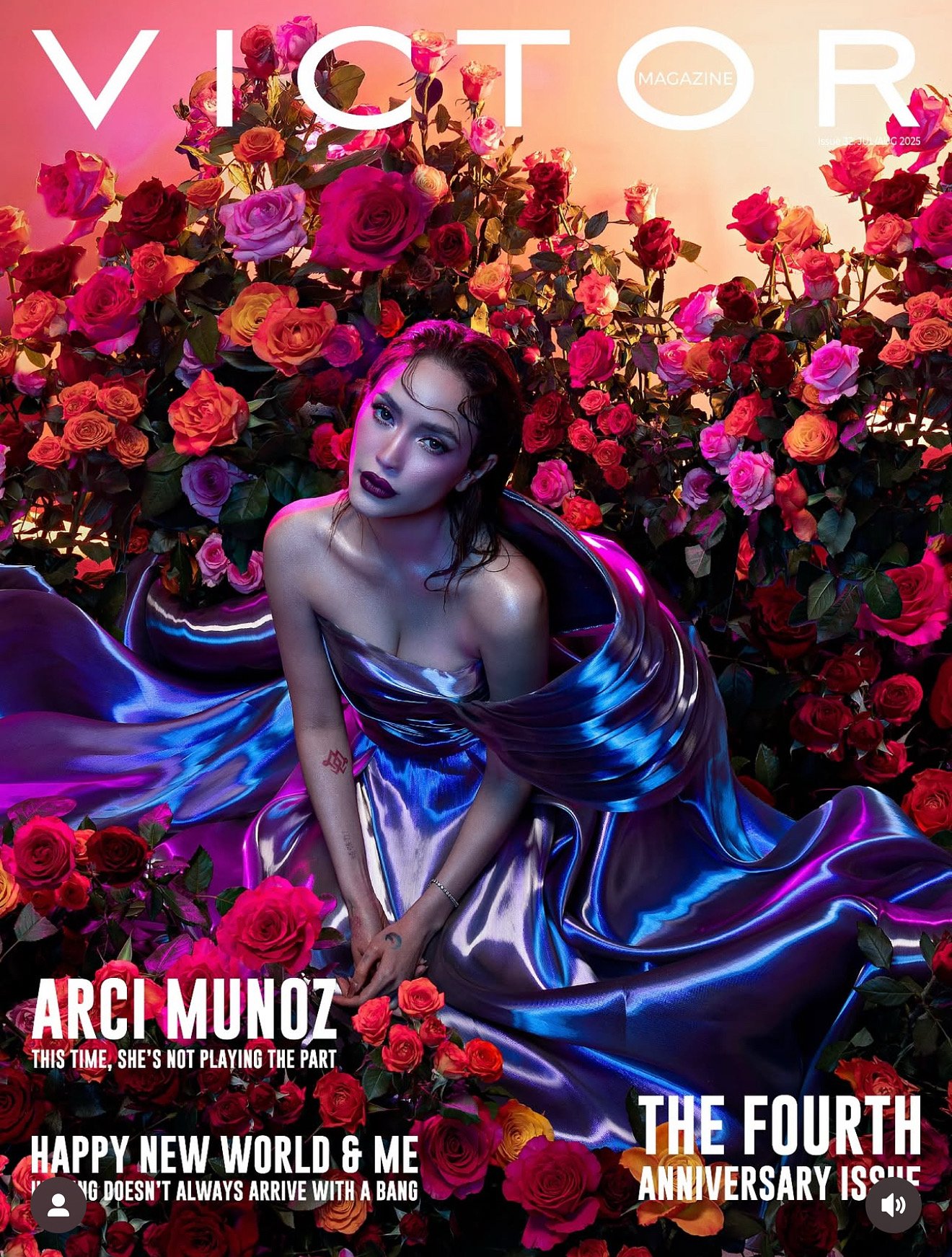 Arci Muรฑoz on the cover of Victor Magazine wearing a metallic blue gown surrounded by roses styled by Houz of Zen