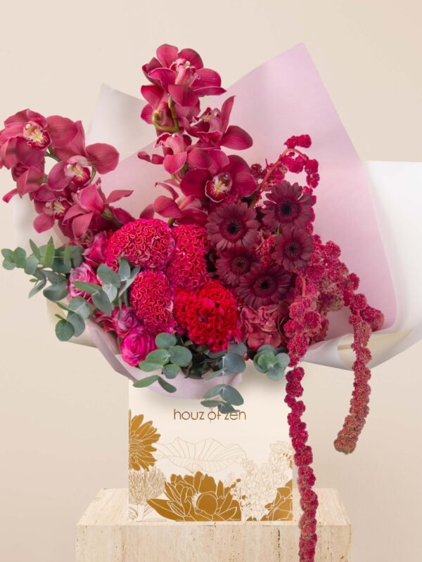 Luxury red flower bouquet with orchids, roses, hydrangeas, and celosia in Houz of Zen wrapping