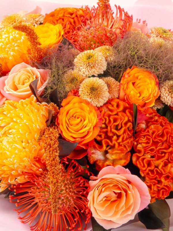 Bouquet with orange celosia and nutan succession flowers