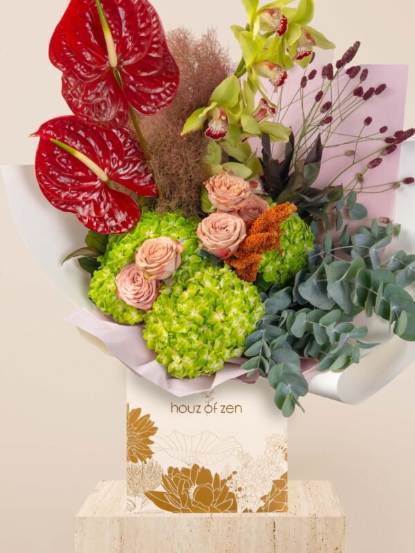 Exotic flower bouquet Dubai with red anthuriums, green hydrangeas, blush roses, and cymbidium orchids.