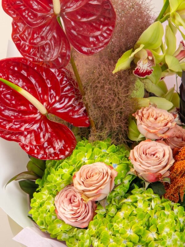 Red anthuriums and green hydrangeas in exotic flower bouquet Dubai.