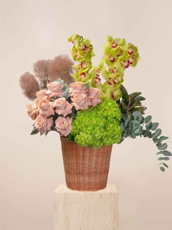 fresh flower basket arrangement in Dubai with cappuccino roses, cymbidium orchids, hydrangeas, and eucalyptus.