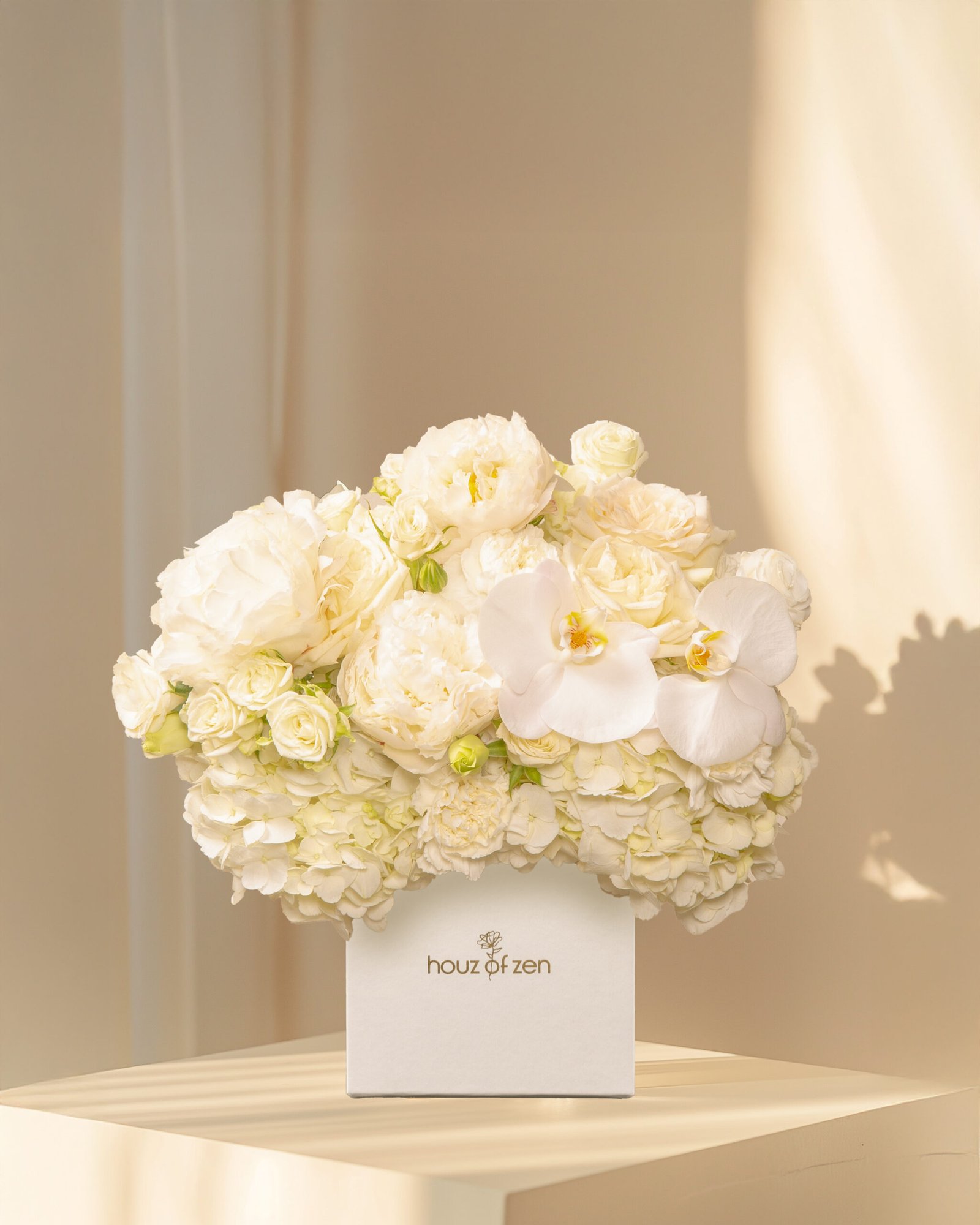 Luxury white flower arrangement in Dubai by Houz of Zen