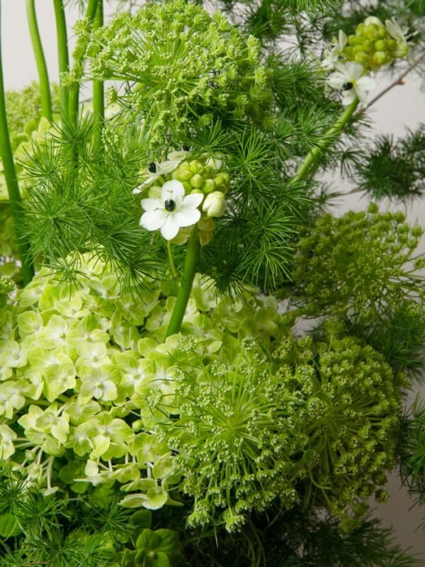 Green botanical close-up from ZEN Fernlight vase arrangement in Dubai