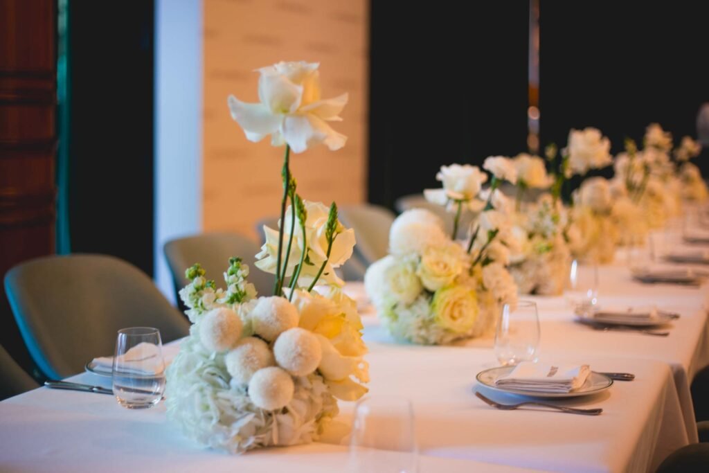 White breakfast table floral arrangements for Emporio Armani at Josette Dubai by Houz of Zen
